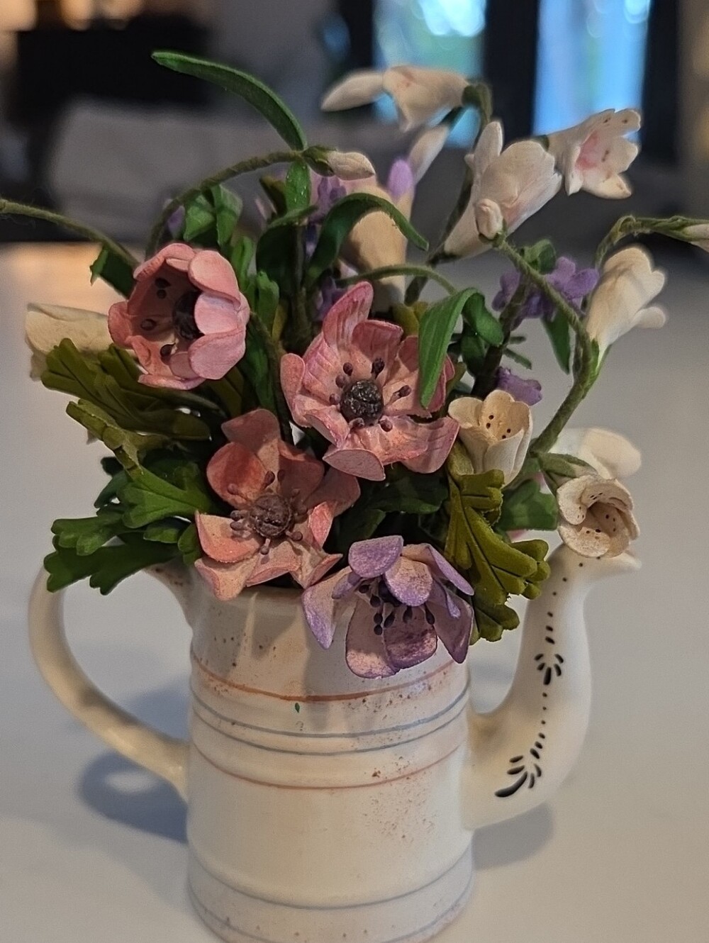 Ceramic Miniture Pitcher With Intricate Clay Flowers.